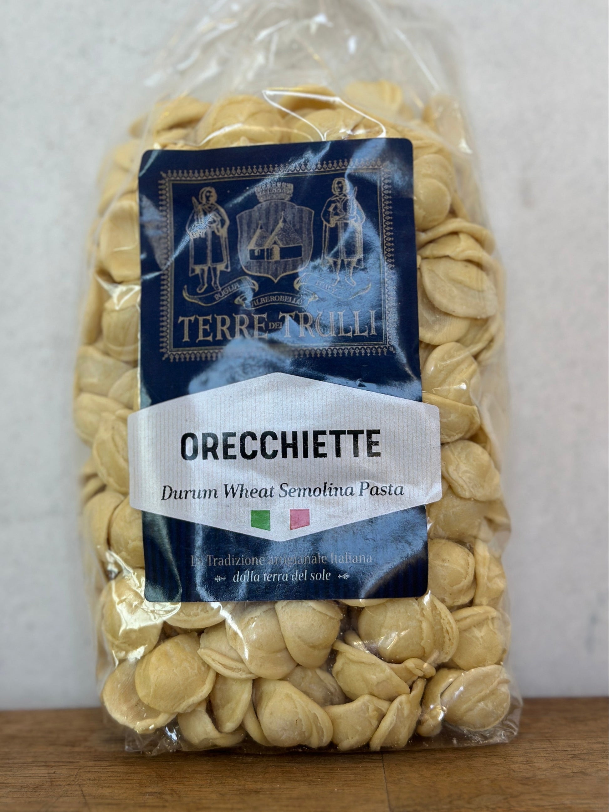 Packaged orecchiette pasta with Terre Trilli label on a white background