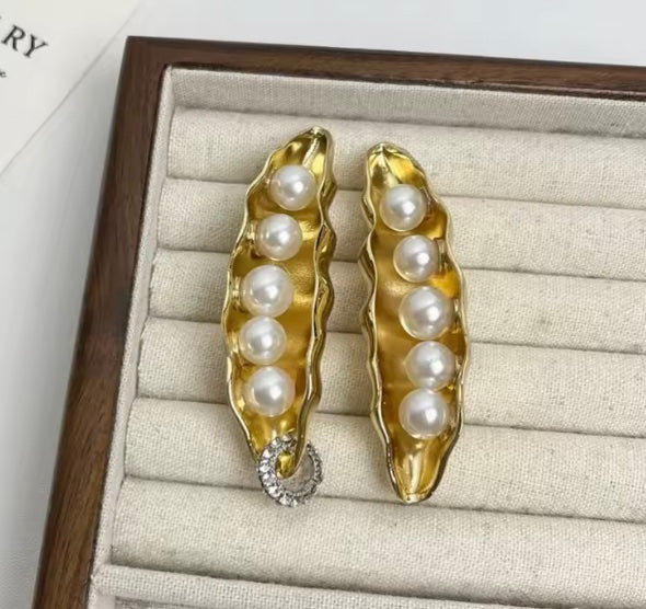 Gold tone Pea in a pearl pod earrings