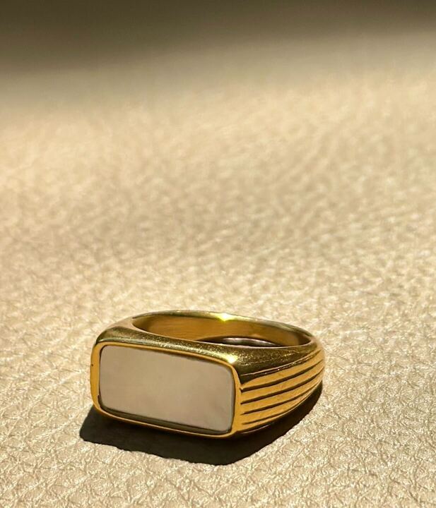 Signet ring with mother of pearl and brass