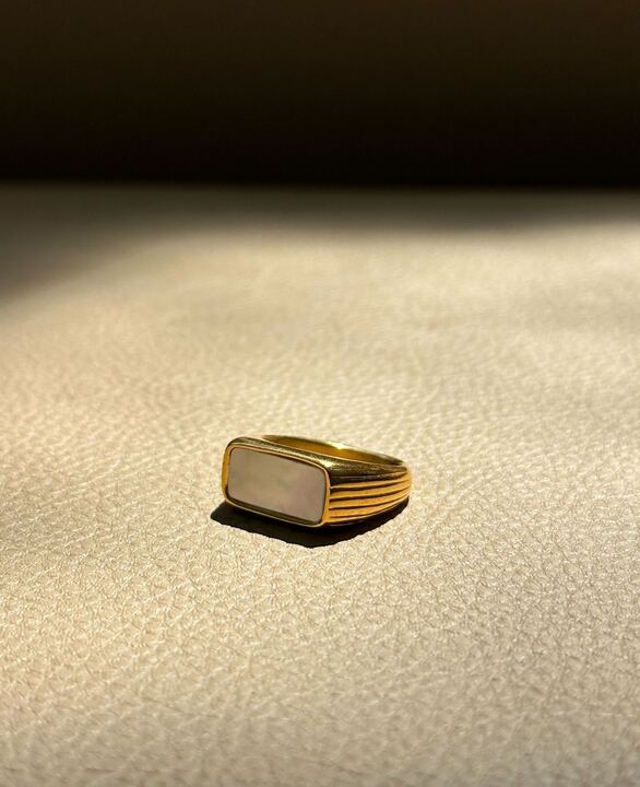 Signet ring with mother of pearl and brass