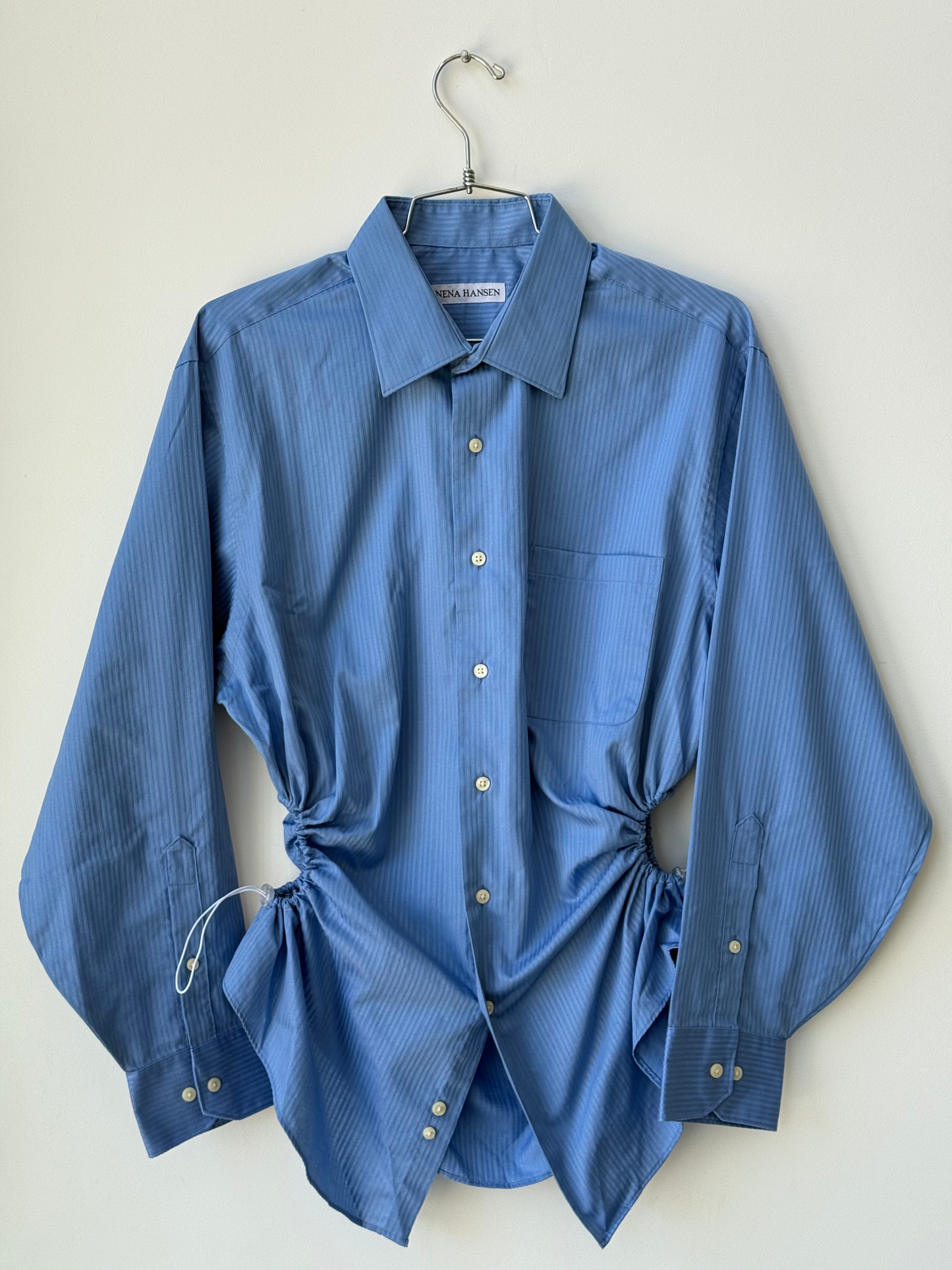 Nena Hansen lightly striped  blue shirt