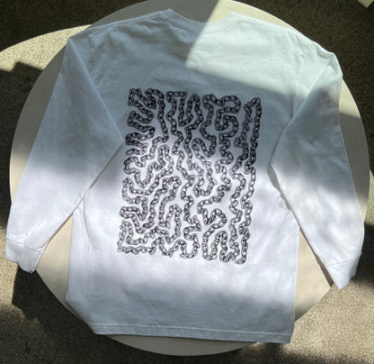 back of shirt - black and white graphic print of chain link curves filling the majority of the back of the shirt